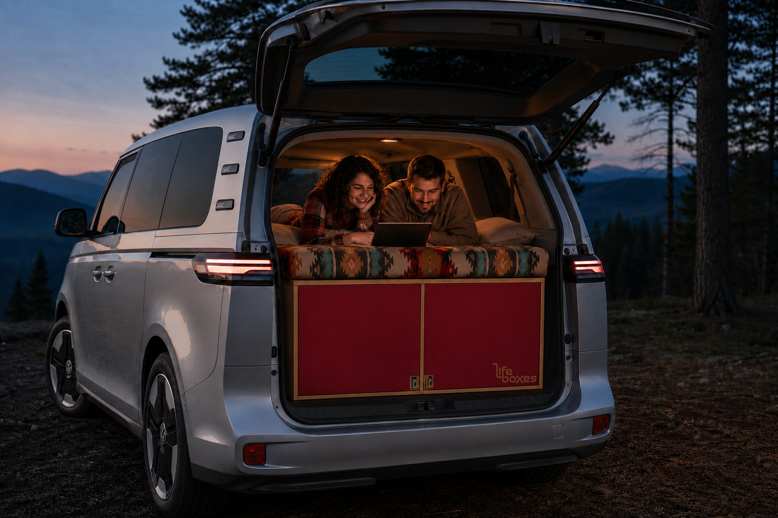 Family enjoying a red LifeBox at dusk